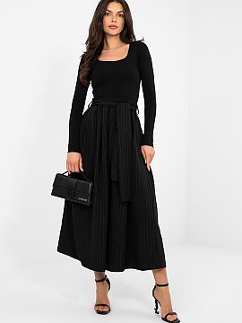 Skirt Italy Moda  Elegant midi skirt with a flared cut is a perfect choice for women who appreciate classic style with a touch of modernity. The high-waisted 