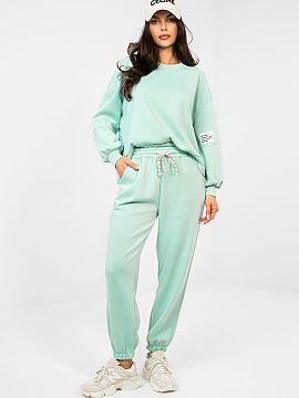 Set Italy Moda  Stylish tracksuit set in a casual edition is the perfect choice for everyday stylizations. The smooth pattern gives it a universal character