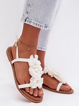 Sandals Step in style  Stylish women\'s sandals made of eco leather stand out with an elegant finish trimmed with shiny thread, which gives them a subtle glow. The