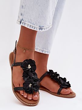 Sandals Step in style  Stylish women\'s sandals made of eco leather stand out with an elegant finish trimmed with shiny thread, giving them a subtle glow. The adju