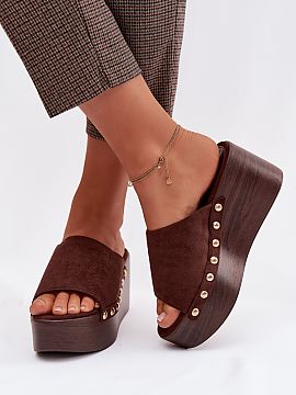 Slippers Step in style  Women\'s sandals made of eco suede are a stylish everyday proposition. The wedge connected with the platform ensures stability and comfort o