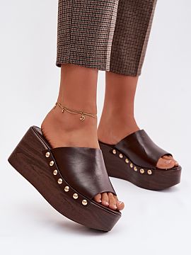 Buskin Step in style  Stylish women\'s flip-flops made of eco leather are a comfortable and eye-catching proposition for everyday wear. The wedge heel combined wi