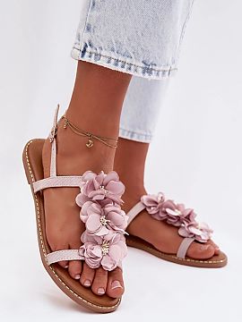 Sandals Step in style  Stylish women\'s sandals made of eco-leather stand out with an elegant finish sewn with shiny thread, which gives them a subtle glow. The ad