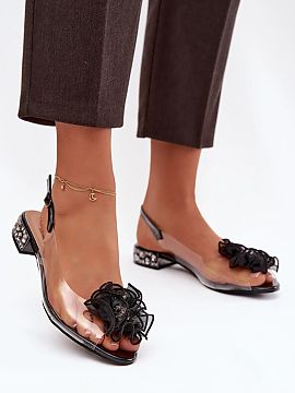 Sandals Step in style  Transparent women\'s sandals are a perfect choice for special occasions. The low heel decorated with crystals subtly shines, adding a jewelr