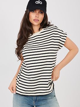 T-shirt Sublevel  Women\'s T-shirt of standard length, made of thick, high-quality cotton that ensures durability and comfort throughout the day. The natural,