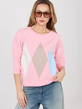 Bluzka Relevance  Comfortable women\'s blouse in a casual style, perfect for casual outfits. The model of standard length has a classic, round neckline and pr