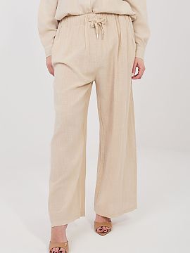 Women trousers Italy Moda  Stylish women\'s wide leg trousers that combine comfort with a fashionable, casual style. The model has wide legs, which provides full freed