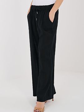 Women trousers Italy Moda  Stylish women\'s wide leg trousers that combine comfort with a fashionable, casual style. The model has wide legs, which provide full freedo