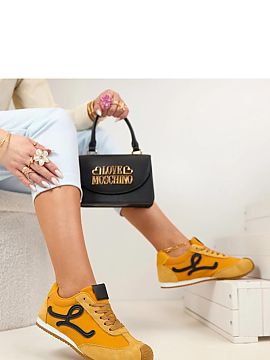 Sports footwear Solea  Stylish low-cut sports shoes are a perfect choice for people who value comfort and a trendy look. The model stands out with decorative patch