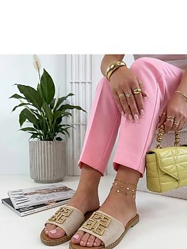 Slippers Solea  Elegant slippers with a metal ornament on the front are a proposal for women who appreciate the combination of comfort and stylish look. Mad
