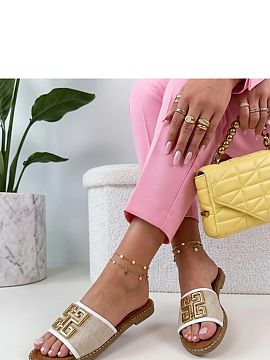 Slippers Solea  Elegant slippers with a metal decoration on the front are a proposal for women who appreciate the combination of comfort and stylish look. M