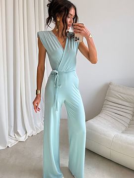 Suit Roco Fashion  The elegant jumpsuit with a fitted cut perfectly accentuates the silhouette. The wrap neckline and waist tie give it a subtle, feminine char