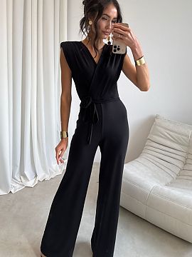 Suit Roco Fashion  The elegant jumpsuit with a fitted cut perfectly accentuates the silhouette. The wrap neckline and waist tie give it a subtle, feminine char