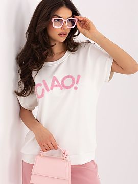 Blouse Rue Paris  A daily blouse with a universal character that will work well in many stylizations. The model stands out with a contrasting inscription on t