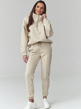 Complete Makadamia  Stylish women\'s tracksuit in a universal size is the perfect combination of comfort and fashionable look. Made of soft, pleasant to the tou