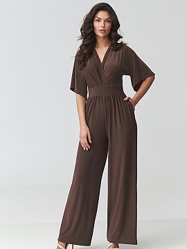 Suit Makadamia  Stylish women\'s jumpsuit is the perfect choice for women who appreciate elegance, comfort, and timeless style. The model stands out with a 