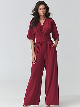 Suit Makadamia  Stylish women\'s jumpsuit is the perfect choice for women who appreciate elegance, comfort, and timeless style. The model stands out with a 