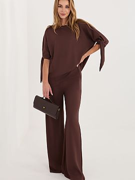 Complete Relevance  Women\'s set consisting of a blouse and trousers is a comfortable and stylish proposition for everyday wear and work. Made of soft and pleas