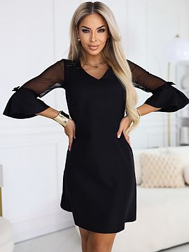Evening dress Numoco  Imagine an evening when you want to look elegant and classy. This dress catches the light with a subtle sheen, and you feel confident from t