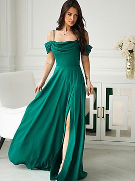 Long gown Bicotone  The fitted top emphasizes the waist, while the long, flowing skirt visually slims the silhouette. The eye-catching slit adds lightness and f