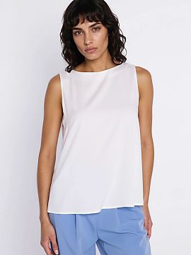 Bluzka Nife  Light and stylish women\'s blouse with a relaxed fit is a perfect choice for everyday wear and warmer days. Made of breathable viscose, it p