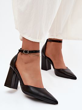 Block heel pumps Step in style  Women\'s pumps made of faux leather on a stiletto heel are an elegant and versatile proposition that will work perfectly in many stylization
