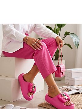 Platform sandals Solea  Stylish slippers with a decorative bow are the perfect combination of comfort and fashionable look. Made of durable plastic material, they a