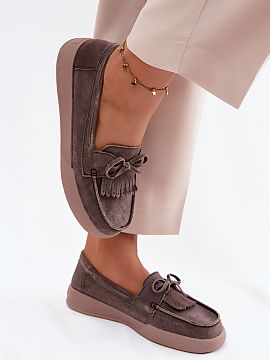 Moccasins Step in style  Women\'s moccasins made of natural suede on a platform are a stylish and comfortable option for everyday wear. The platform gently lifts the