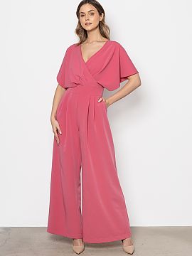 Suit awama  Elegant jumpsuit with a modern cut that combines comfort with sophisticated style. The top has a wrap neckline subtly emphasizing the silhou
