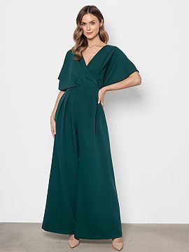 Suit awama  Elegant jumpsuit with a modern cut that combines comfort with refined style. The top has a wrap neckline subtly emphasizing the silhouette a