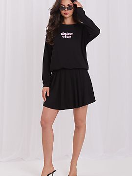 Set Relevance  Stylish women\'s set consisting of a blouse and a skirt with built-in shorts is the perfect everyday proposition, combining comfort and a fa
