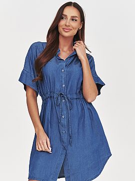 Daydress Makadamia  This denim shirt dress is the perfect choice for women who appreciate comfort, style, and timeless design. The button-up model with a classi