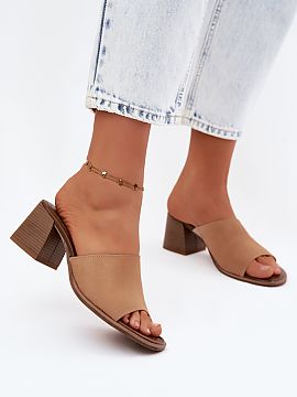 Heeled sandals Step in style  Women\'s leather mules with suede heels are an elegant proposal for women who appreciate classic style in a modern edition. The simple, time