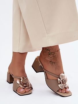 Heeled sandals Step in style  Women\'s leather sandals with block heels are an elegant proposal created for special occasions. The classic design makes the model perfectl