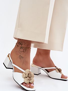 Heeled sandals Step in style  Women\'s leather sandals with block heels are an elegant proposal created for special occasions. The classic design makes the model perfect 
