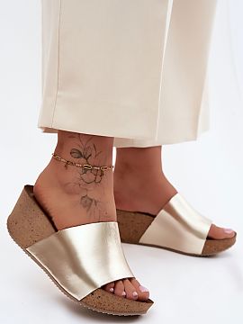 Buskin Step in style  Women\'s sandals on a cork wedge. Made of high-quality natural leather, they provide durability and comfort. A trendy style that will be a p