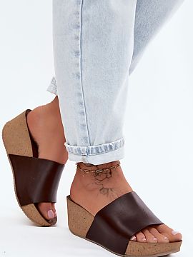 Buskin Step in style  Women\'s sandals on a cork wedge. Made of high-quality natural leather, they provide durability and comfort. A fashionable style that will b