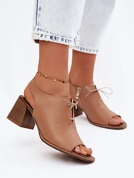 Heel sandals Step in style  Women\'s sandals made of natural leather are a stylish proposition for women who appreciate elegance and comfort. The model, set on a column