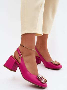 Block heel pumps Step in style  Women\'s pumps made of natural leather are an elegant and eye-catching proposition for special occasions. The model with an open heel looks 