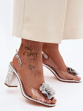Heel sandals Step in style  Transparent women\'s sandals are a striking proposal designed for special occasions. The subtle form combined with transparent elements give