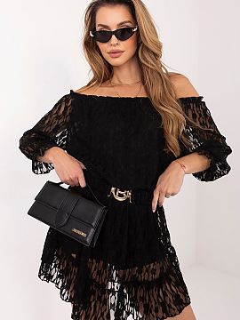 Suit Italy Moda  An elegant women\'s jumpsuit is a unique proposal combining comfort and a stylish, feminine look, perfect for everyday wear. The model made 