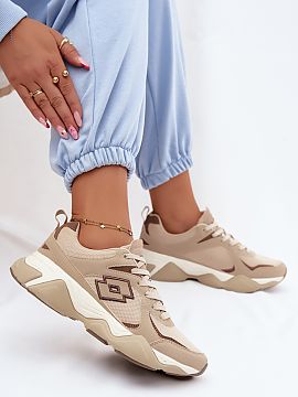 Sport Shoes Step in style  Ladies\' sneakers from the Lotto brand are a comfortable and stylish choice for everyday wear. Made from a combination of eco-leather and fa