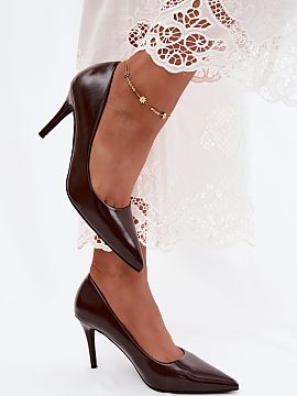 High heels Step in style  High heels made of patent eco-leather are a stylish option for women who appreciate elegance and classic designs. The impressive, glossy fin