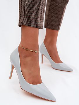 High heels Step in style  High heels made of patent eco-leather are a stylish option for women who value elegance and classic designs. The striking, glossy finish giv