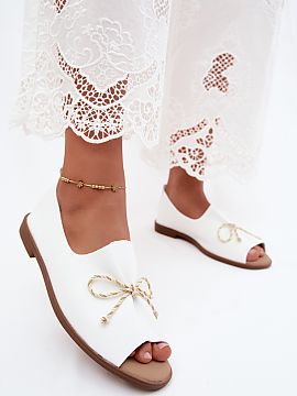 Sandals Step in style  Women\'s sandals made of imitation leather are a stylish and feminine option for warm days. The model with a closed heel provides a better f
