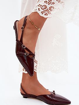 Sandals Step in style  Women\'s sandals made of faux leather are a stylish option for women who appreciate fashionable designs and an eye-catching appearance. The 