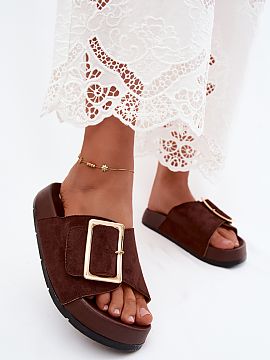 Platform sandals Step in style  Ladies\' sandals made of suede imitation. They are set on a platform that optically slims the silhouette. The golden buckle is an elegant ac