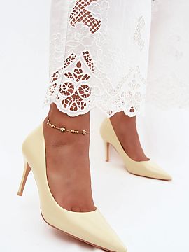 High heels Step in style  Heels made of glossy eco-leather are a stylish option for women who value elegance and classic designs. The eye-catching, shiny finish gives