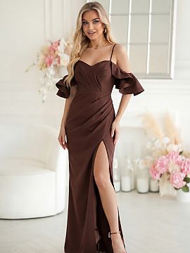 Long dress Bicotone  A phenomenal maxi dress with a fitted cut, distinguished by a sculptural shoulder line and cascading, stiffened sleeves. The silhouette is a