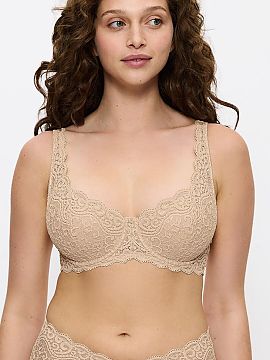 Soft Triumph  Soft Amourette 10209584-0026 bra is an elegant proposal for women who value comfort, excellent support, and timeless style. The model is equ